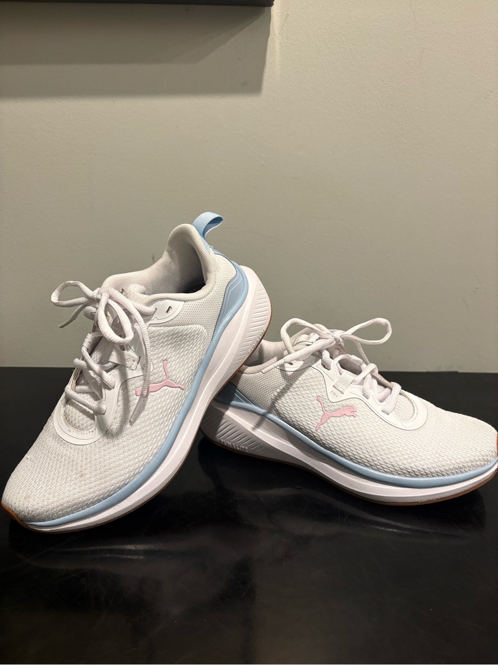 Puma Women's White Knit Running Sneakers with Light Blue Accents and Pink Logo